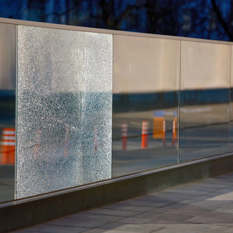 Frosted glass panel in sunlit urban setting